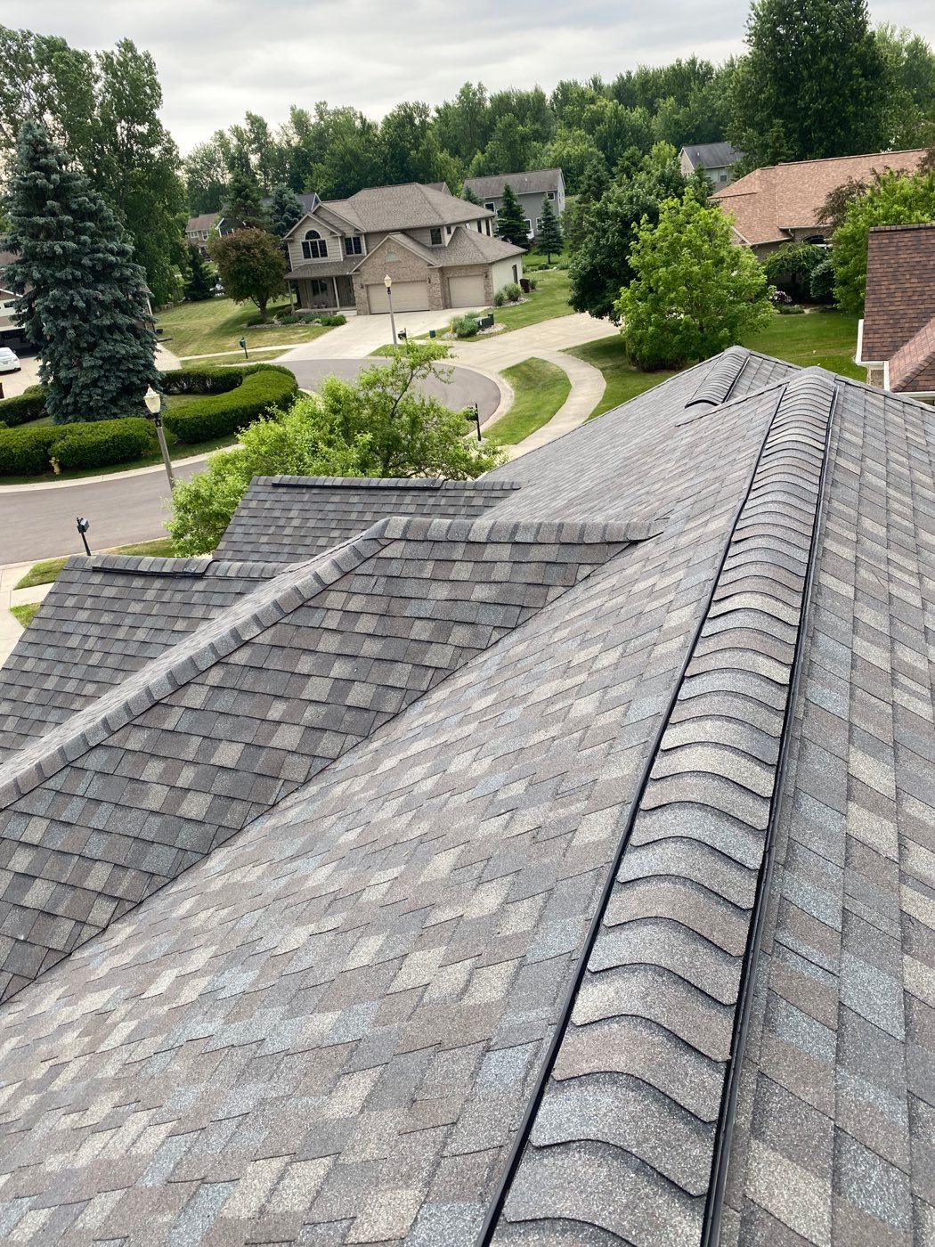 Aerial view of a new architectural shingle roof in the Lansing area