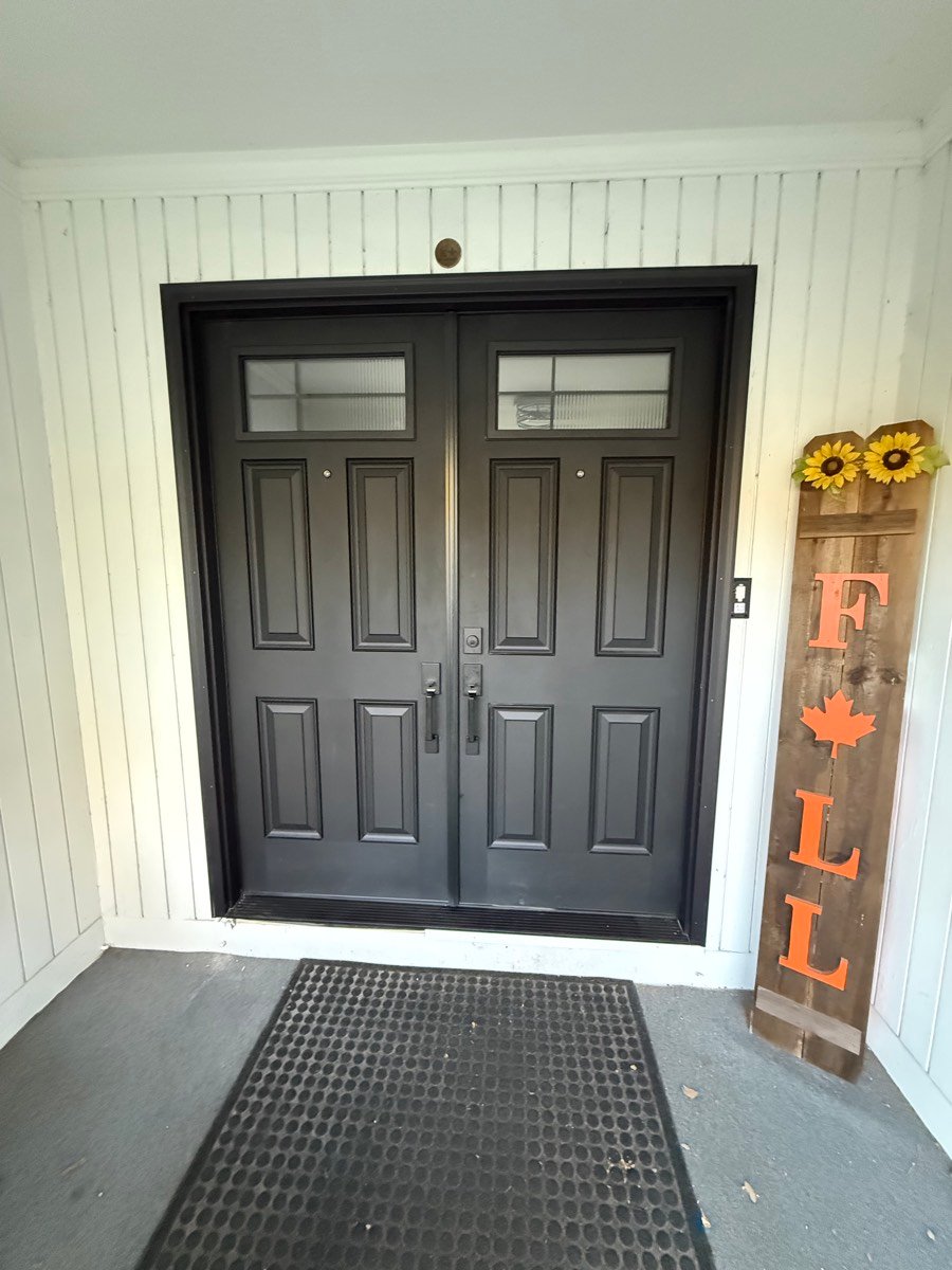 New dark gray double entry doors installed by MBG Exteriors & More